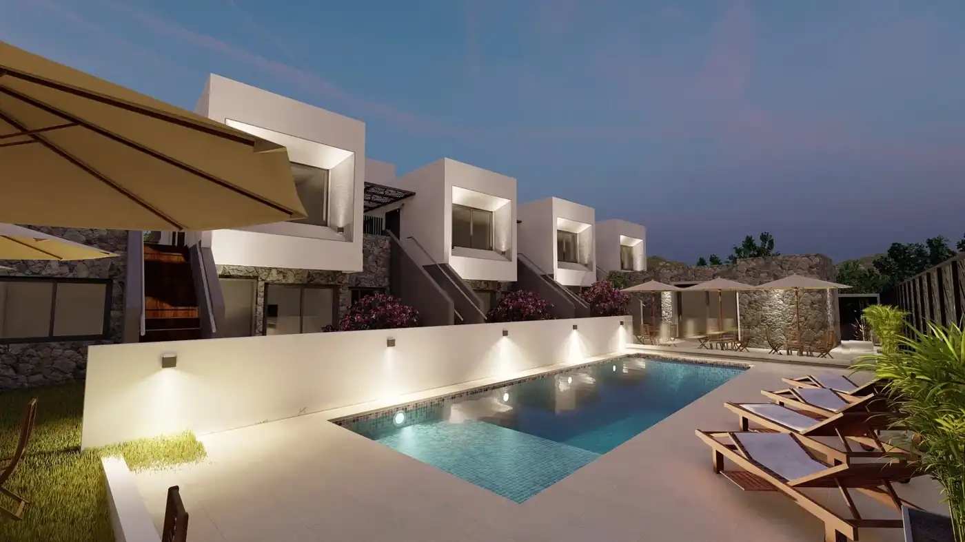 Apart de la Villa · piscina al atardecer